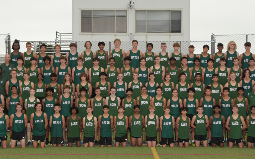 boys cross country team on bleachers